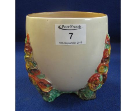 Clarice Cliff pottery vase of tripod form with relief painted flowers and foliage.(B.P. 24% incl. VAT)