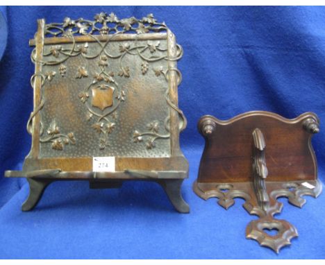 A Victorian Gothic design mahogany shelf together with an unusual picture easel stand overall with relief, berry and foliate 