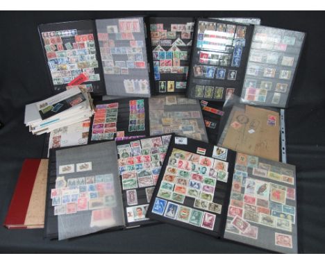 All World stamp collection in nine stockbooks plus envelope of First Day Covers, 100's of stamps wide range of countries.(B.P