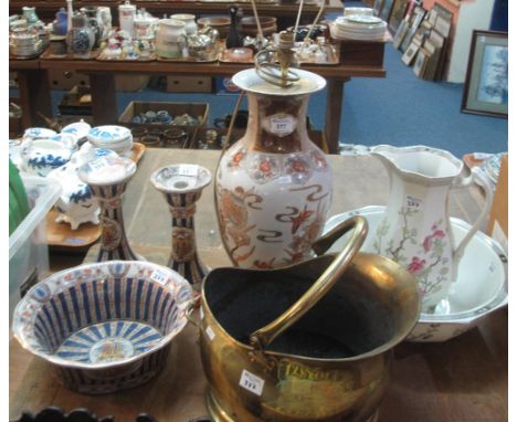 Copper helmet shaped coal scuttle, together with a Staffordshire floral jug and basin set, together with an Oriental baluster