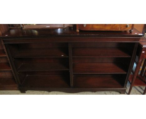 Reproduction mahogany open book case on bracket feel with adjustable shelves.(B.P. 24% incl. VAT)   CONDITION REPORT:  Light 