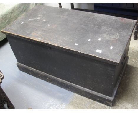 19th Century stained pine trunk, the interior with fitted candle box.(B.P. 24% incl. VAT)
