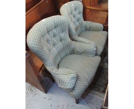A pair of 20th Century button back upholstered arm chair on turned legs.  (2)(B.P. 24% incl. VAT)