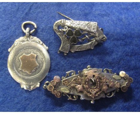 A silver fob, silver Irish harp brooch and Victorian silver brooch missing pin.(B.P. 24% incl. VAT)
