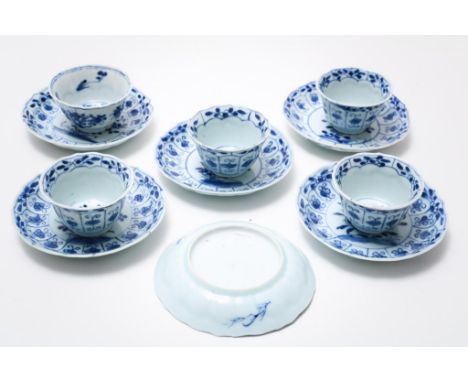 Set of 5 Kangxi porcelain cups and 6 saucers, decorated with flowers in medaillions, and insects, hereby Kangxi cup marked on