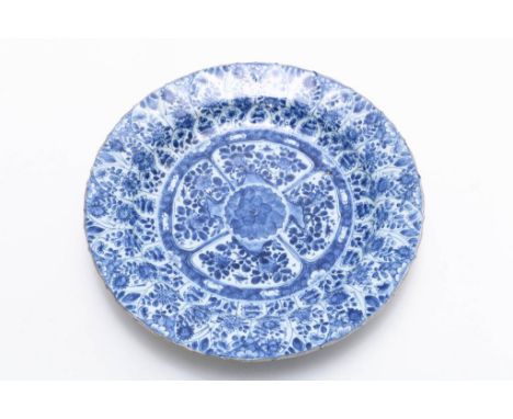 Porcelain Kangxi "lotus" dish with decor of flowers, mark on  bottum, China 18th century, diam. 38 cm. (cracks)Porseleinen ge