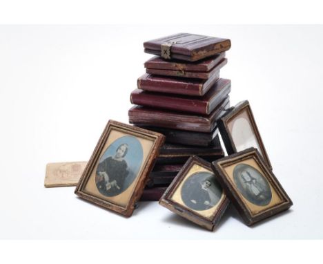 &nbsp;Lot of 14 photo's, 2 daguerreotype's and 12 ambrotype's with&nbsp;portraits, in part leather etui's, 19th century.&nbsp