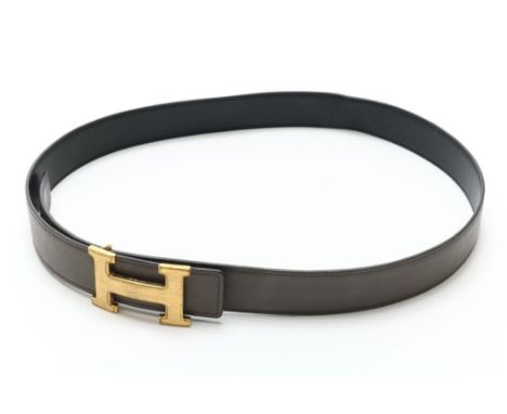 Hermes gray/ black leather belt, reversible, with gold brushed  clips, m. 90Hermes, grijs/ zwart riem, reversible, met goudkl