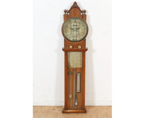 Barometer in oak case, England ca. 1920, h. 107 cm.Barometer in eiken kast met enkelvoudige Torricellibuis met  glasreservoir
