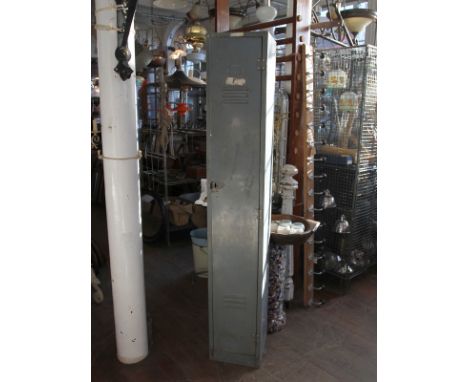 Mid Century steel industrial locker coated in grey, with internal high shelf and hook. H : 180 W : 30 cm