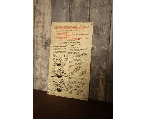 Mid Century enamel 'Treatment for Electric Shock' sign including illustrations H: 33 W:24 cm