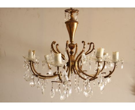 A Victorian 8 arm brass and glass chandelier with candle lamp holder H : 53 cm