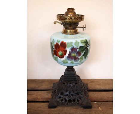 Victorian ceramic hand painted floral oil lamp with cast base and brass fixture -a/f H: 39 cm