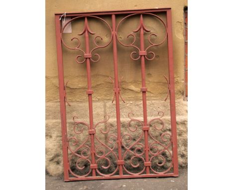 An iron scrollwork design railing in red H: 90 W: 62 cm