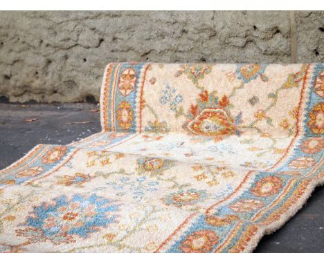 An antique style 3 piece carpet runner with geometric design L : 7500 x 700 cm