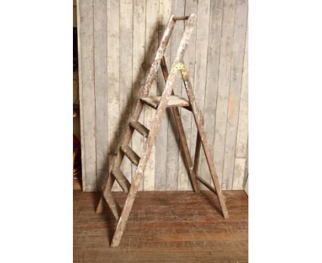 A vintage pitch pine collapsible step ladder with standing platform H: 180 cm
