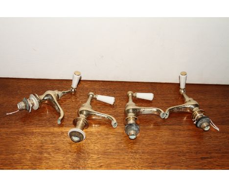 2 pairs of Victorian brass lever basin taps with ceramic handles
