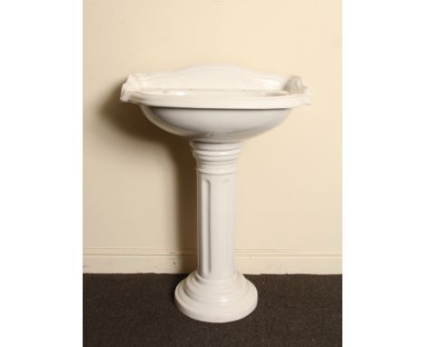 Victorian style porcelain wash basin with fluted pedestal H: 90 W: 64 cm
