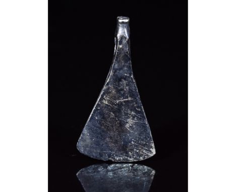 Ca.700-900 AD. A fine Viking Scandinavian skeuomorphic amulet shaped as a bearded axe with an intact loop; Reference for Viki