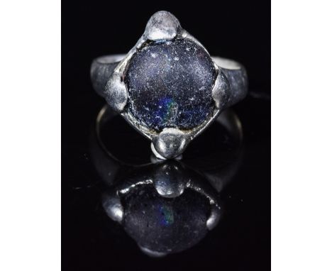 Ca.600-900 AD. Interesting wearable Viking / Saxon silver ring with a clasped bezel holding a blue gem. Fine Condition, weara
