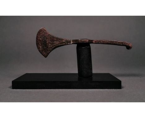 Ca.1100 AD. An interesting Medieval iron axe head composed by rectangular shaped shaft for attachment decorated with geometri
