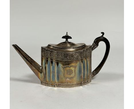 A George III silver teapot, Charles Aldridge, London 1793, oval, with bright-cut decoration, further engraved with a crest an