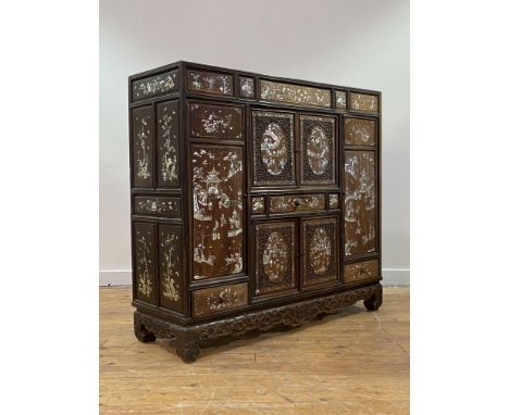 A fine Chinese rosewood, fruitwood and mother of pearl inlaid cabinet, 19th century, the panelled top over two twin cupboard 