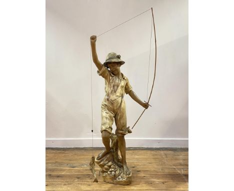 A large Goldscheider pottery figure of a fisher boy, c. 1900, signed Chere, modelled with his left hand holding a wooden rod,