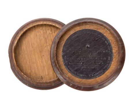 A TMRAIRE TREEN TABLE SNUFF BOX, CIRCA 1838, turned from T‚m‚raire oak with plain sides, the lid with period label issued by 