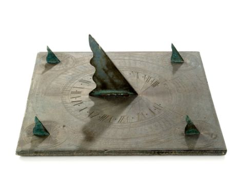 A POLYHEDRAL SLATE SUNDIAL BY RICHARD MELVIN, CIRCA 1850, signed Melvin, London and inscribed on the chapter ring 51§ 50~ Nor