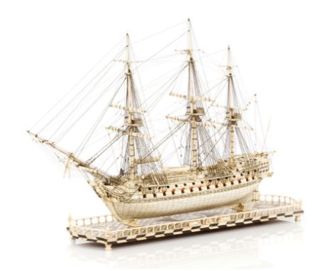 A FINELY RIGGED AND CARVED BONE PRISONER-OF-WAR STYLE MODEL OF THE 74-GUN SHIP BELLEROPHON , the planked and pinned hull with