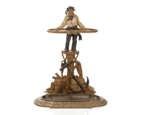 A MARITIME STICK STAND BY ALFRED CORNEAU, 19TH CENTURY, modelled as a Jack Tar holding a coiled rope and standing on a mast t