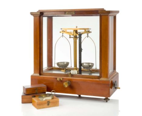 A PRECISION BALANCE BY L. ORTLING, LONDON, CIRCA 1890, signed in the beam as per title and inscribed To Weight 100 Grammes, t