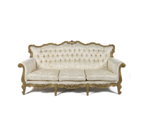 A GOLD PAINTED ROCOCO REVIVAL THREE PIECE SUITE (3)To include a three seat sofa, 198cm wide; 87cm high, and a pair of matchin