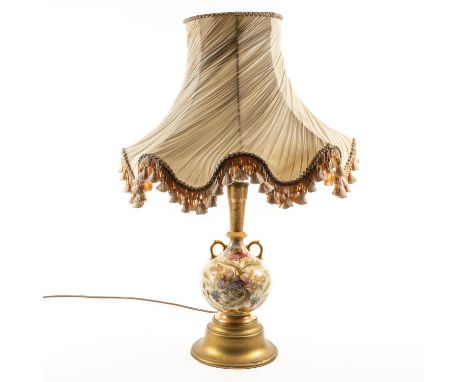 A LARGE FLORAL PAINTED CERAMIC TWIN HANDLED TABLE LAMPWith twisted pleated shade, 86cm high incl. shade