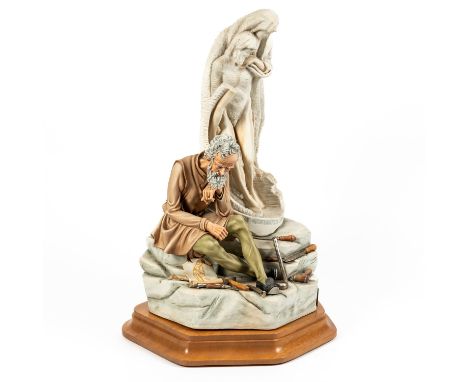 CAPODIMONTE; A FIGURE OF MICHELANGELO IN CONTEMPLATION WITH PIETÀOn stepped wooden base, 65cm high