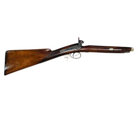 REAR END OF A SINGLE BARREL SHOTGUN BY R.DUGARD.  BACK ACTION LOCK ENGRAVED WITH HUNTING SCENES 