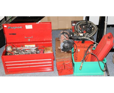 A collection of assorted snap on and other modern tools 