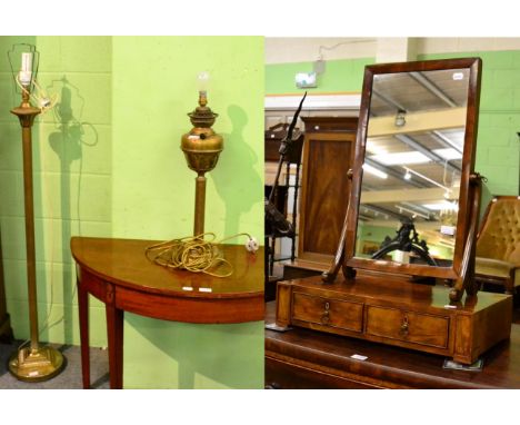 A 19th century mahogany mirror together with a brass columnar standard lamp and similar oil lamp (converted) (3) 