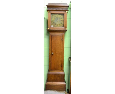 An oak thirty hour longcase clock, signed Benj Reeves, Lamberhurst, circa 1770, flat top pediment, 11-inch brass dial with ch