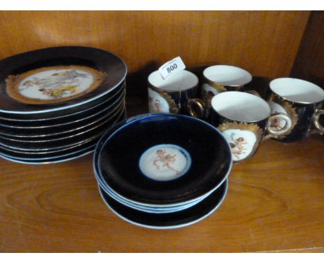 GROUP OF SEVRES CUPS, SAUCERS AND PLATES DECORATED WITH CHERUBS