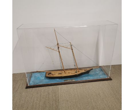 A scratch built cased wooden model of  'The America' 1:32 scale, winner of 1851 cup, built by John Bertola 88 x 57 x 23cm (Or
