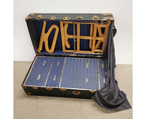 A vintage travelling wardrobe trunk, 105 x 55 x 40cm.