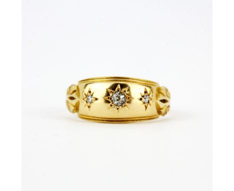 A hallmarked 18ct yellow gold diamond set ring, (L). Approx 2.8g.