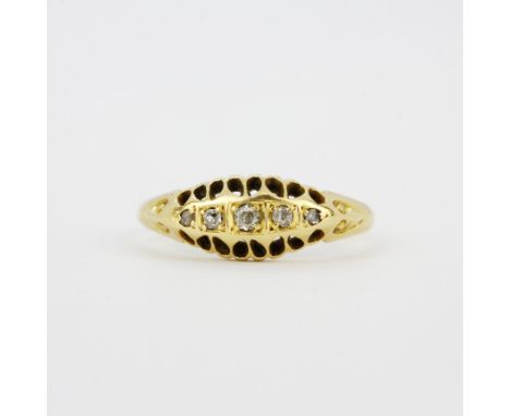 A hallmarked 18ct yellow gold diamond set ring, (L.5). Approx. 2.6g.