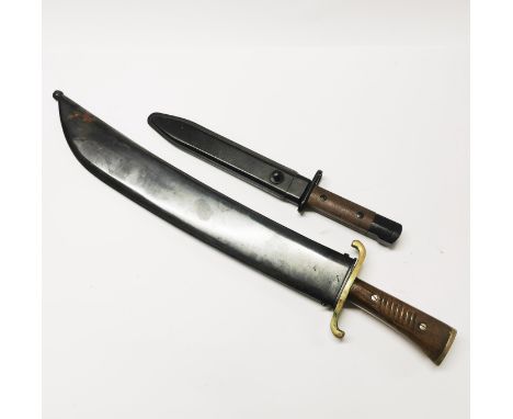 A bayonet and a machete, L. 55cm.