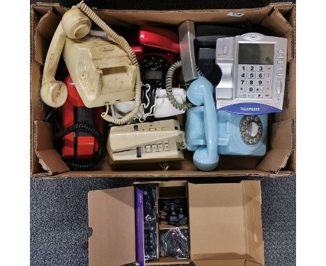 A group of vintage telephones.
