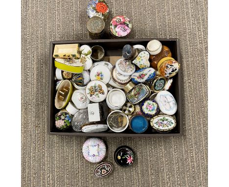 A group of mixed ceramic and metal pill boxes including closionne and limoges.