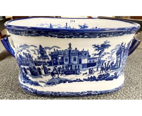 A large blue and white, two handled ceramic foot bath, 46 x 31 x 21cm.