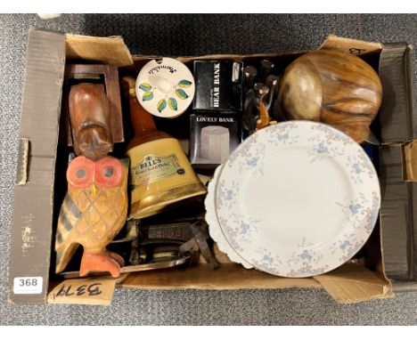 A box of mixed ceramic, wooden and metal items.